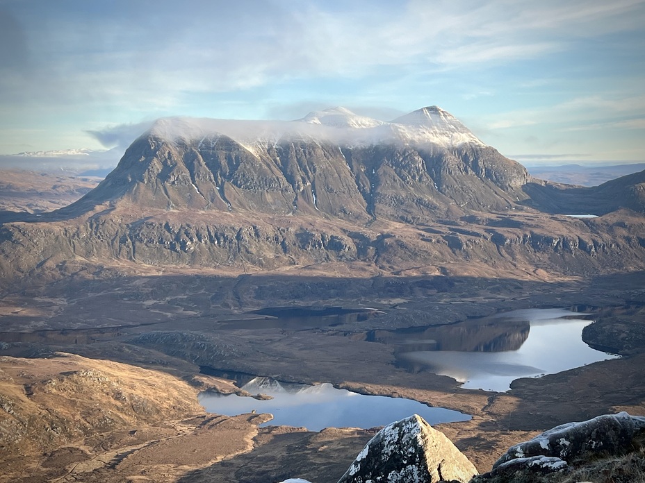 View of a misty Cul Mor from halfway up Stac Pollaidh. Day hikes in Summer Isles