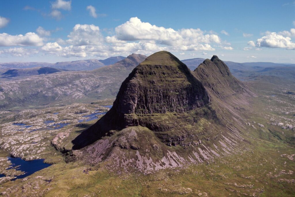 Dome shaped Suilven. Day hikes in Summer Isles